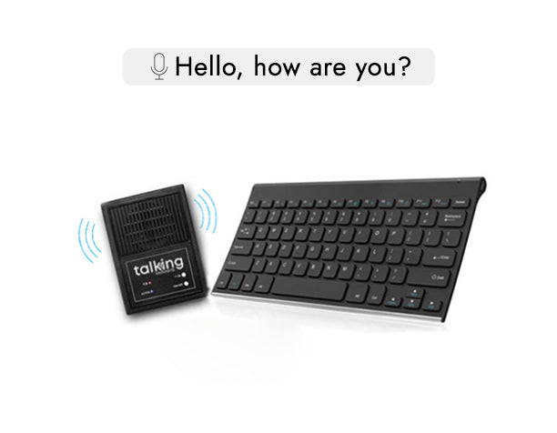 A black wireless keyboard sits next to a black speaker labelled “talking,” with blue sound wave icons indicating speech. Above them, a speech bubble reads, “Hello, how are you?” suggesting the keyboard is used to generate spoken messages via the speaker.