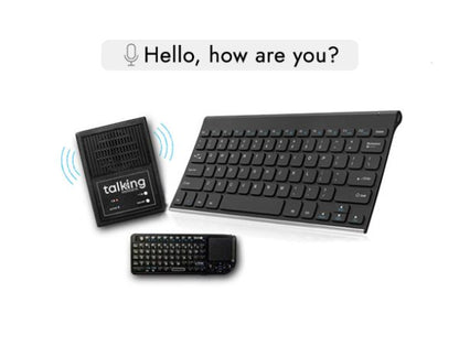 Two black keyboards—a full-sized wireless keyboard and a smaller mini keyboard with built-in trackpad—are shown alongside a black speaker labelled “talking,” emitting sound waves. Above them, a speech bubble reads, “Hello, how are you?” indicating the keyboards can generate speech via the speaker.