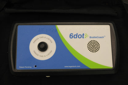 6dot BrailleCoach which is rectangular with a button to "press tag and listen" and circular speaker, and blue, green and white label with text "patent pending" and "www.logantech.com"